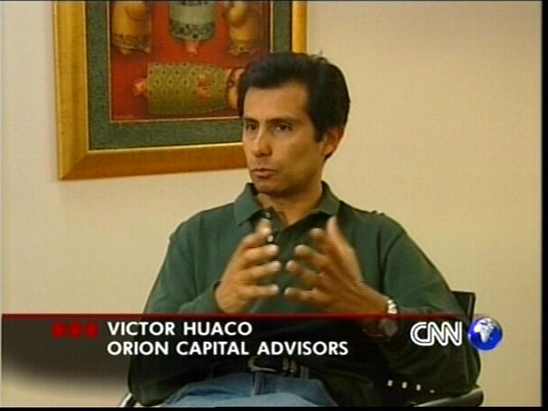 Файл:Victor Huaco Lenta.ru office 2001 CNN report.JPG